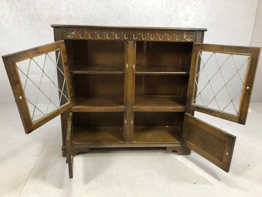 Oak carved sideboard with glazed and leaded doors and cupboard under - Image 3 of 4