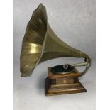 Monarch Gramophone, registered no. 560461, in oak case with 'His Master's Voice' emblem, brass horn,