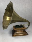 Monarch Gramophone, registered no. 560461, in oak case with 'His Master's Voice' emblem, brass horn,