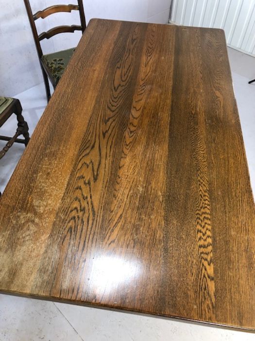 Oak dining table with heavily carved baluster legs and cross stretcher, with one carver and four - Image 5 of 5