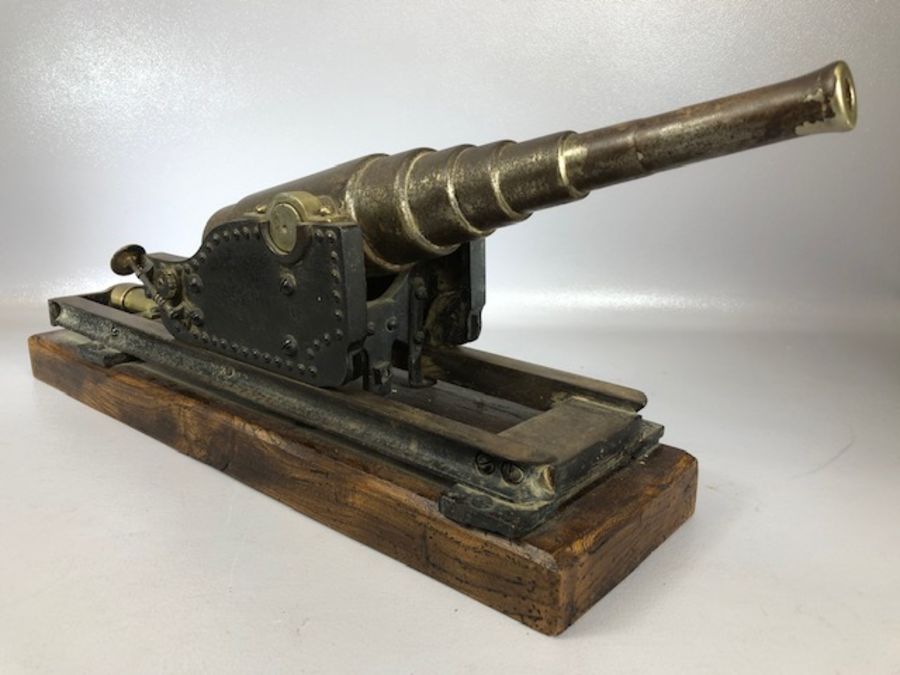 Reproduction Black Powder Cannon with tapering barrel on wooden base with firing pin in the shape of - Image 3 of 7