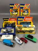 Collection of boxed Dinky die cast toys to include two Happy Cabs, a Rolls Royce Phanton V and a