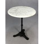 Pub -style bistro table with cast iron base and marble top, approx 60cm in diameter