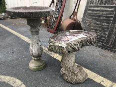 Two stone birdbaths, the tallest approx 64cm in height