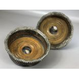 Pair of Silver coloured Wine Bottle coasters with wooden inserts
