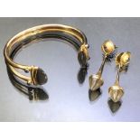 9ct Gold Bangle set with Sapphires and Smokey Gem stones with a set of drop earrings set with the