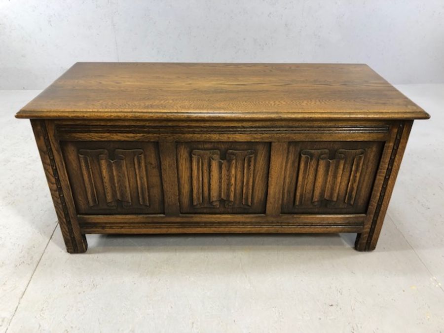 Oak coffer with linen fold design, approx 107cm x 46cm x 50cm tall