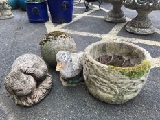 Collection of garden statuary to include pot, duck, rabbit and ball