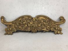 Gilded carved wooden relief depicting acanthus leaves and grapes, approx 113cm in length