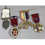 Collection of four hallmarked silver badges and medals including Royal Masonic