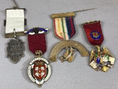 Collection of four hallmarked silver badges and medals including Royal Masonic