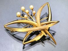 9ct Gold Brooch set with seed pearls approx 5 x 5cm and 7.7g