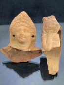 Two moulded pottery fragments depicting figures, possibly Roman period, the taller approx 9cm in