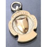 Silver & 9ct Gold hallmarked pendant with shield design total weight approx 6.8g
