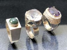 Three Silver rings set with stones