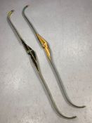 Two vintage wooden Archery Bows one by Don Harkness named The Hereford and a second very similar but