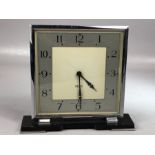 Smiths Clock, an 8 day Art Deco timepiece with square silvered dial, contained in a chrome case 16cm
