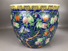 Chinese porcelain fishbowl, decorated with foliate and butterfly design, approx 36cm in diameter