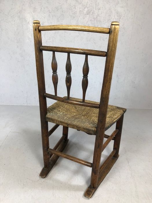 Antique rush seated child's rocking chair with turned supports, approx 81cm tall (A/F) - Image 5 of 5