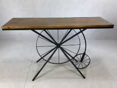 Modern console table with a penny farthing base, approx 121cm x 41cm x 75cm tall