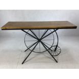 Modern console table with a penny farthing base, approx 121cm x 41cm x 75cm tall