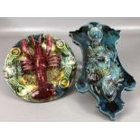 Palissy ware majolica lobster plate, approx 19cm in diameter, along with a majolica wall plaque in