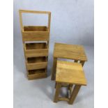 Two modern occasional tables and a small storage stand