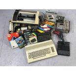 Collection of vintage computer gaming items to include a Commodore 64 and a collection of games