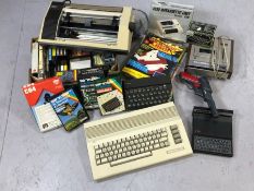 Collection of vintage computer gaming items to include a Commodore 64 and a collection of games