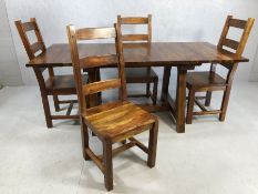 Contemporary dark wood dining table and four chairs. Table approximately 87cms x 90cms - 190cms