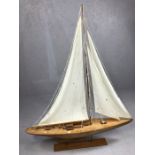 Model sailing ship on Plinth. Teak Hull, rigging and detailing to deck, approx 100cm Long and