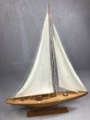 Model sailing ship on Plinth. Teak Hull, rigging and detailing to deck, approx 100cm Long and
