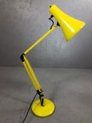 Striking yellow vintage anglepoise lamp on weighted base