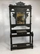 Large Green Man hall stand, heavily carved with drawer to centre, bevel edged mirror with aged
