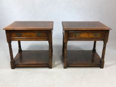 Pair of dark wood bedside cabinets on turned legs with shelf and drawer under, each approx 61cm x