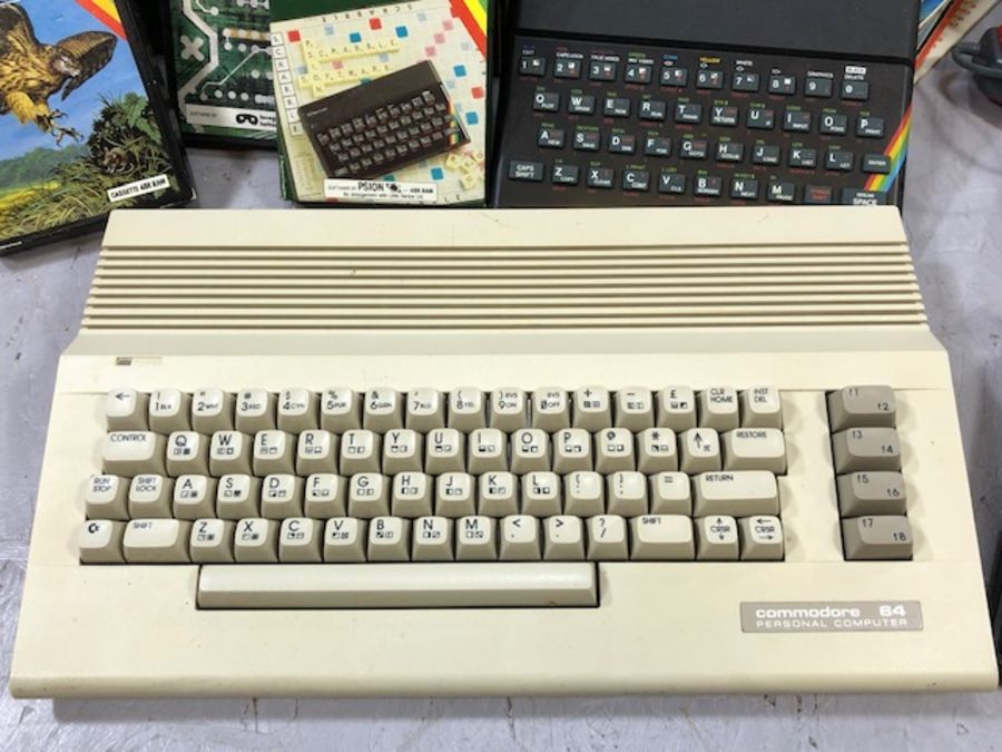 Collection of vintage computer gaming items to include a Commodore 64 and a collection of games - Image 4 of 7