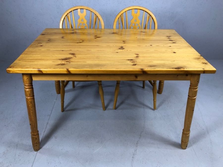 Pine kitchen table with four wheelback chairs, table approx. 120cm x 80cm - Image 2 of 3