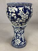 Blue and white ceramic jardiniere on stand, approx 63cm in total height (A/F)