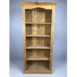 Large pine bookcase with five shelves, approx 83cm x 32cm x 198cm tall