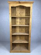 Large pine bookcase with five shelves, approx 83cm x 32cm x 198cm tall