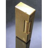 Vintage Dunhill gold plated lighter, approx 6.5cm in height