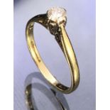 Delicate 9ct Gold Solitaire ring set with a single diamond size 'H'