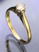 Delicate 9ct Gold Solitaire ring set with a single diamond size 'H'