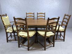 Ercol refectory style "Golden Dawn" dining table with six ladder back chairs including two