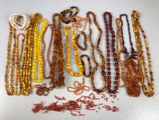 Large collection of Amber coloured beads/ Necklaces and Coral Jewellery