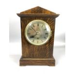 RAF Officers Mess mantel clock by F.W. Elliott Ltd, 1939, the triangular topped oak case with
