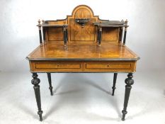 Ebonised and veneer desk or display table with galleried top with ebonised piers, two drawers under,