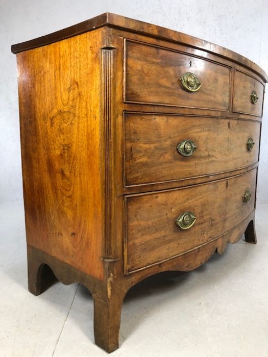 Victorian bow-fronted four drawer chest of drawers on splay front feet, approx 115cm x 55cm x 90cm - Image 7 of 8