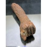Wooden fragmentary arm, hand with thumb extended and four fingers pressed to palm, with some