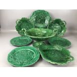 Majolica green glazed leaf design twin handled comport, along with seven leaf design plates in